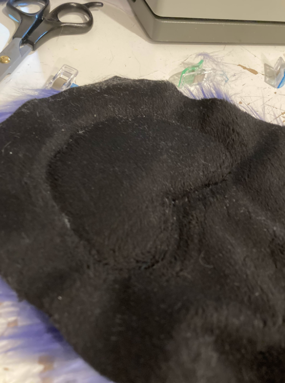 Sewn paw pad with extra minky still attached